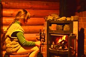 У камина